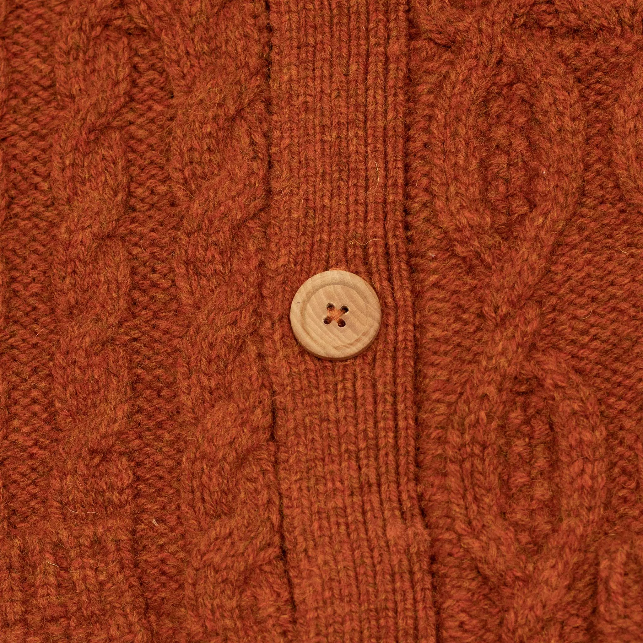 Crazy cable knit Aran cardigan in pumpkin wool